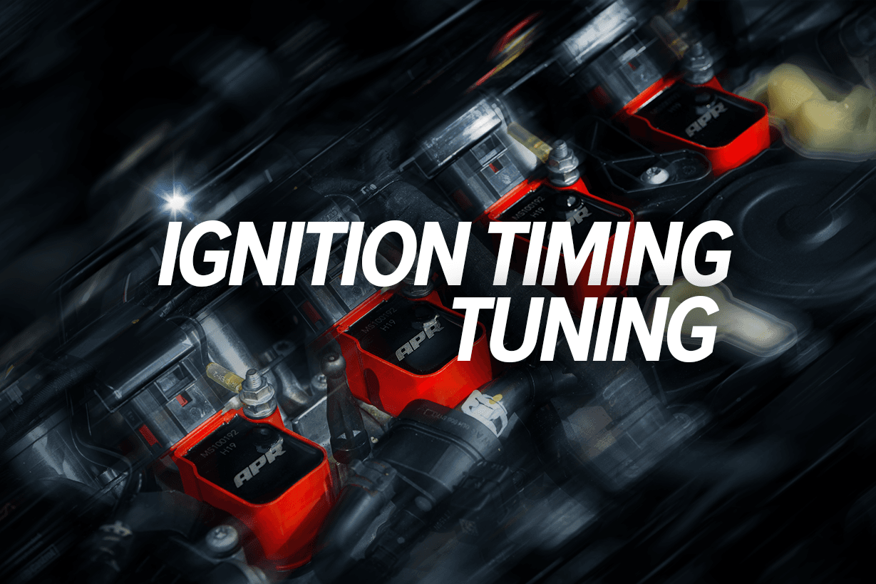 Close-up of red APR coil packs on a modern engine, with bold text reading “Ignition Timing Tuning” overlayed across the ignition system.